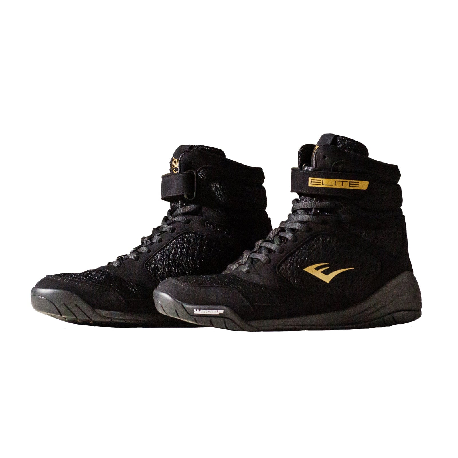 A pair of black high-top boxing shoes with gold accents, featuring a lace-up closure and the Everlast brand logo.
